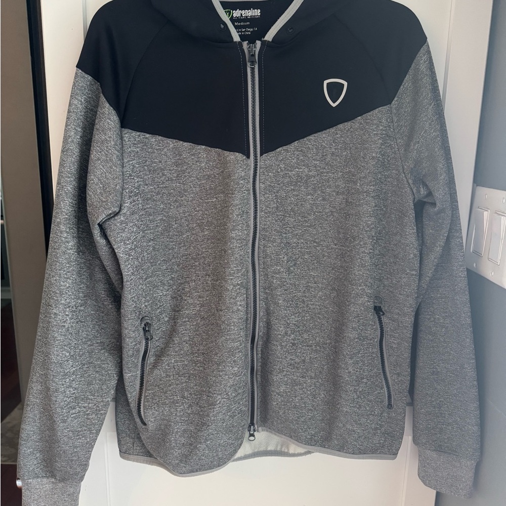 Lacrosse Men’s Medium zip jacket hoodie. Zipper front. Pockets. Hoodie
